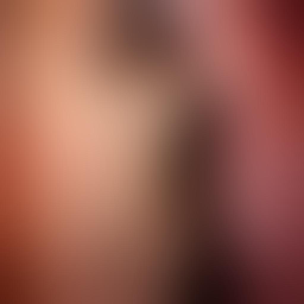 A captivating nude photograph showcasing the graceful contours of the human body intertwined with abstract art elements, soft lighting, and an ethereal background that enhances the sensuality of the subject. The composition should emphasize artful poses that depict both elegance and intimacy, with a harmonious blend of color and shadow. super-realistic. vibrant colors. soft focus.